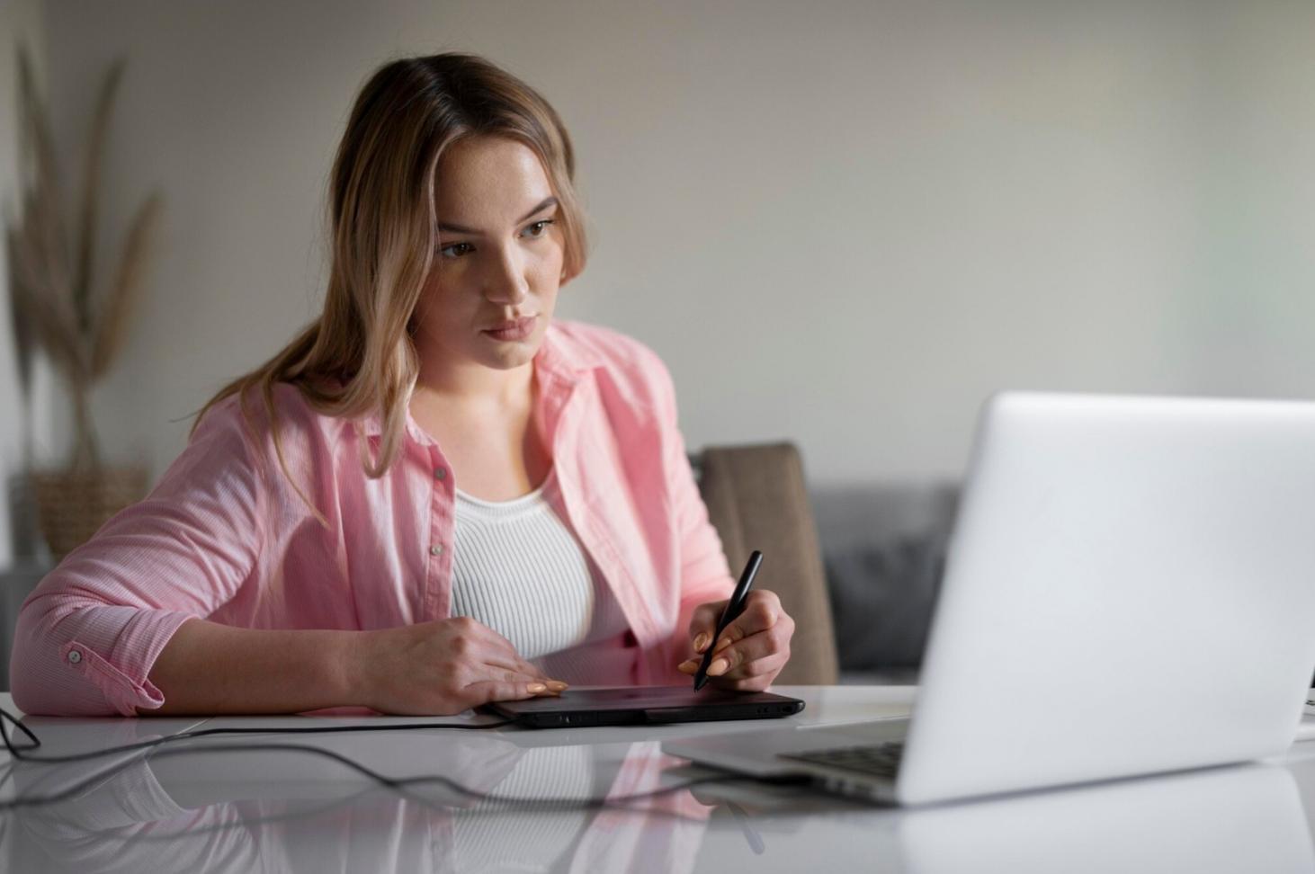 Student working on financial analysis at home office setup